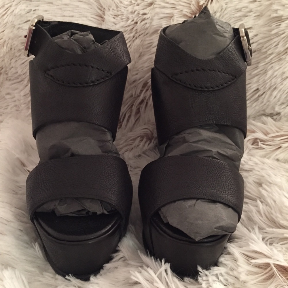 BRAND NEW black leather wedges